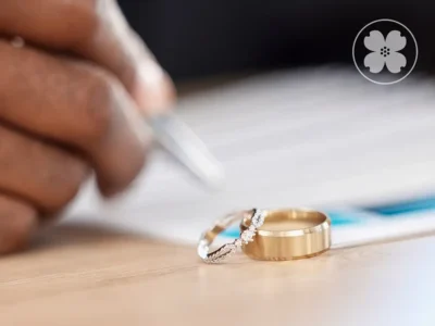 A Male And Female Wedding Ring On A Table.