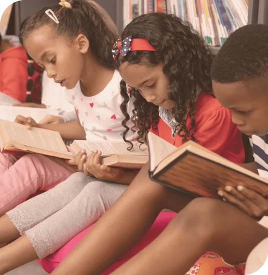 Kids reading books.